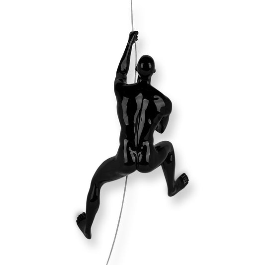 Black lacquered climber sculpture in resin, wall-mounted with steel cable, capturing dynamic rock climbing adventure with sophisticated black finish.